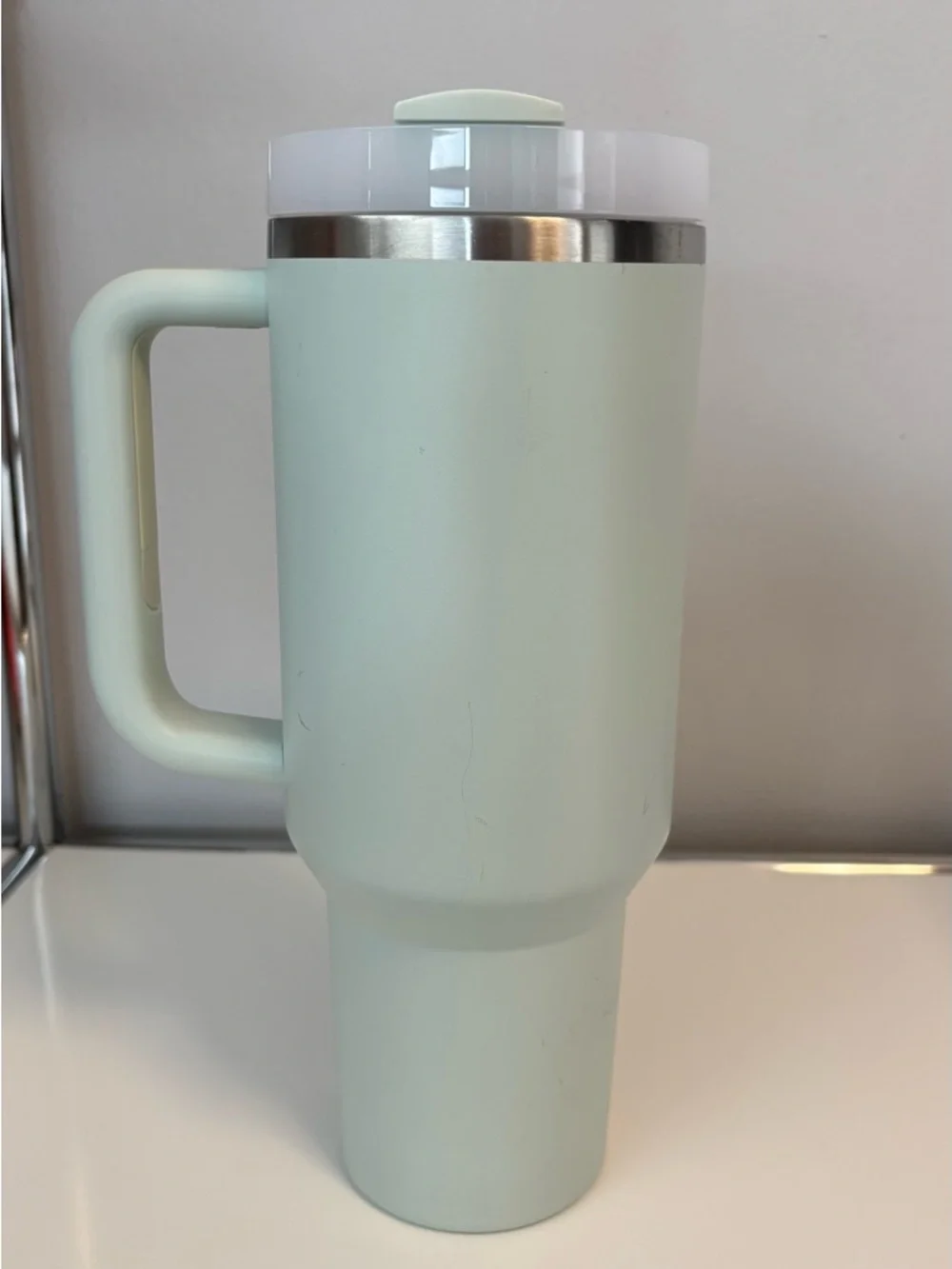 One Stanley Mint Green Travel Tumbler with Handle one grey blue Stanley Tumbler - Picture 4 of 11
